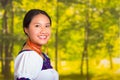 Beautiful young woman wearing traditional andean blouse with necklace, standing posing for camera, smiling happily Royalty Free Stock Photo