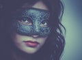 Beautiful young woman wearing Venetian mask Royalty Free Stock Photo