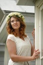 Beautiful young woman wearing a wreath Royalty Free Stock Photo