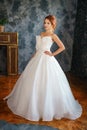 Beautiful young woman in wedding dress, romantic image of the bride, beautiful make-up and hairstyle