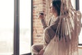 Woman wearing cashmere nightwear relaxing in cabin Royalty Free Stock Photo