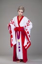 Beautiful young woman in white kimono Royalty Free Stock Photo