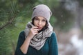 Beautiful young woman in wintertime outdoor