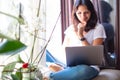 Beautiful young woman working a laptop computer Royalty Free Stock Photo