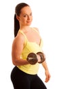 Beautiful young woman working out with dumbels in fitness gym