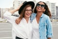 Beautiful Young Women In Casual Clothes Having Fun Outdoors Royalty Free Stock Photo