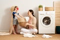 Family doing laundry Royalty Free Stock Photo