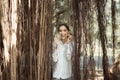 Beautiful young woman hands showing mini heart at public park in the morning,Happy and smiling,Relax time