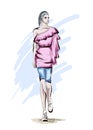 Beautiful young women in a pink dress and blue breeches. Hand drawn fashion girl. Fashion model posing. Sketch. Royalty Free Stock Photo