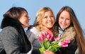 Beautiful young women with pink tulips Royalty Free Stock Photo