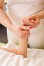 Woman having traditional hands and wrist massage