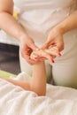 Woman having traditional hands and wrist massage