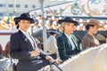 Beautiful young women riding horses and celebrating Seville`s April Fair. Royalty Free Stock Photo