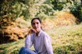 Beautiful young women sitting and looking something at public park,Happy and smiling,Relaxing time,Positive thinking