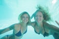 Beautiful young women underwater