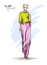 Beautiful young women in a yellow blouse and pink breeches. Hand drawn fashion girl. Fashion model posing. Sketch. Royalty Free Stock Photo