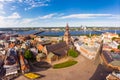 Beautifull aerial panoramic view from drone In sunny summer Day to histirical center Riga and quay of river Daugava. Famous