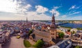 Beautifull aerial panoramic view from drone In sunny summer Day to histirical center Riga and quay of river Daugava. Famous