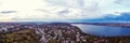 Beautifull aerial panoramic view from the drone to the gorgeous Lake surrounded by city. Autumn time