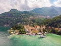 Beautifull aerial panoramic view from the drone to the Varenna - famous old Italy town on bank of Como lake. High top view to Royalty Free Stock Photo