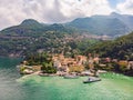 Beautifull aerial panoramic view from the drone to the Varenna - famous old Italy town on bank of Como lake. High top Royalty Free Stock Photo