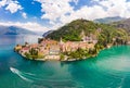 Beautifull aerial panoramic view from the drone to the Varenna - famous old Italy town on bank of Como lake. High top Royalty Free Stock Photo