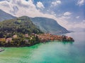 Beautifull aerial panoramic view from the drone to the Varenna - famous old Italy town on bank of Como lake. High top view to Royalty Free Stock Photo