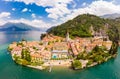 Beautifull aerial panoramic view from the drone to the Varenna - famous old Italy town on bank of Como lake. High top view to