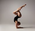 Beautifull flexible blonde girl posing. Gymnastics.