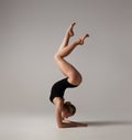 Beautifull flexible blonde girl posing. Gymnastics.