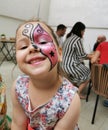 Beautifull girl with facepainting butterfly