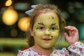 Beautifull little girl smiling with face-painting