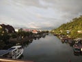 beautifull sunsets sky from river and ship docking in siti nurbaya