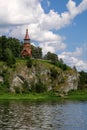 Beautifull wooden christian orthodox church on the bank of the r