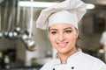 A beautifull young female chef posing for camera Royalty Free Stock Photo