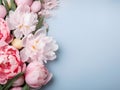 Vibrant Springtime Peony Display on a Pastel Blue Background for a Floral Banner. Generative AI Royalty Free Stock Photo