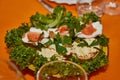 Festive New Year's Table Setting with Cheese Baskets, Fresh Salmon, and Greens