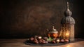 Ramadan Iftar Setup with Tea Set, Dates, and Glowing Lantern Royalty Free Stock Photo