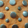 Beautifully arranged round iron buttons