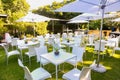 Beautifully arranged tables and chairs in a garden at a conference venue in Cape Town, South Africa