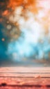 beautifully blurred photograph with a wooden surface in the foreground leading to a bokeh of warm and cool lights