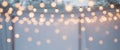 Beautifully Blurred String Lights Creating a Magical Atmosphere at Outdoor Event. Royalty Free Stock Photo