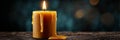 Beautifully Burning Candle with Molten Wax Dripping Down the Sides, Creating a Romantic Atmosphere Royalty Free Stock Photo