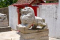 Beautifully carved Chinese style stone lion statue close-up Royalty Free Stock Photo