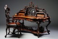 a beautifully carved victorian writing desk with quill and inkpot