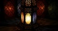 A beautifully crafted lantern casting a warm glow in a dimly lit environment Royalty Free Stock Photo