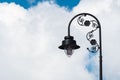 A Beautifully Crafted Street Lamp Facing the Blue Cloudy Sky