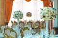 Beautifully decorated in blue green colors wedding hall with flower decoration. Royalty Free Stock Photo