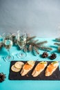 Beautifully decorated catering banquet table with different food snacks and appetizers on corporate christmas birthday party event Royalty Free Stock Photo