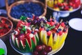 Beautifully decorated catering banquet table with different food snacks and appetizers on corporate christmas birthday party event Royalty Free Stock Photo